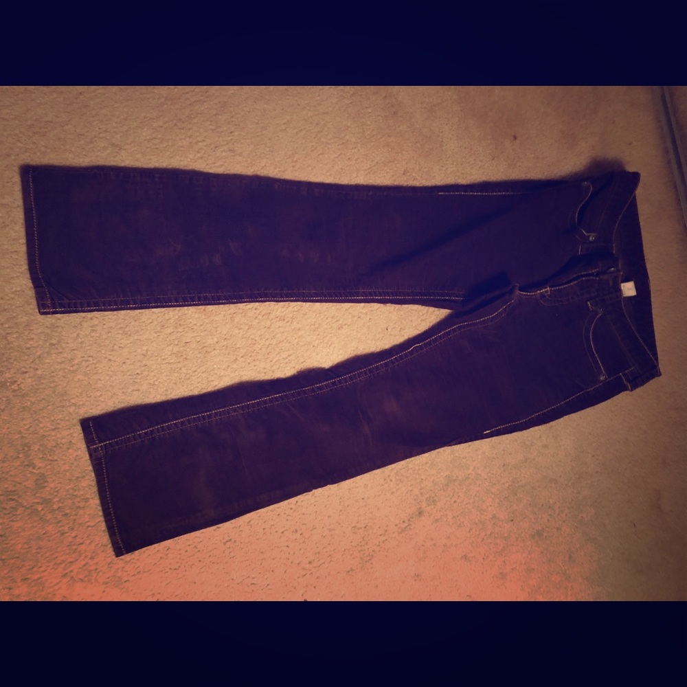 Brown pair of corduroy jeans made by London Jean